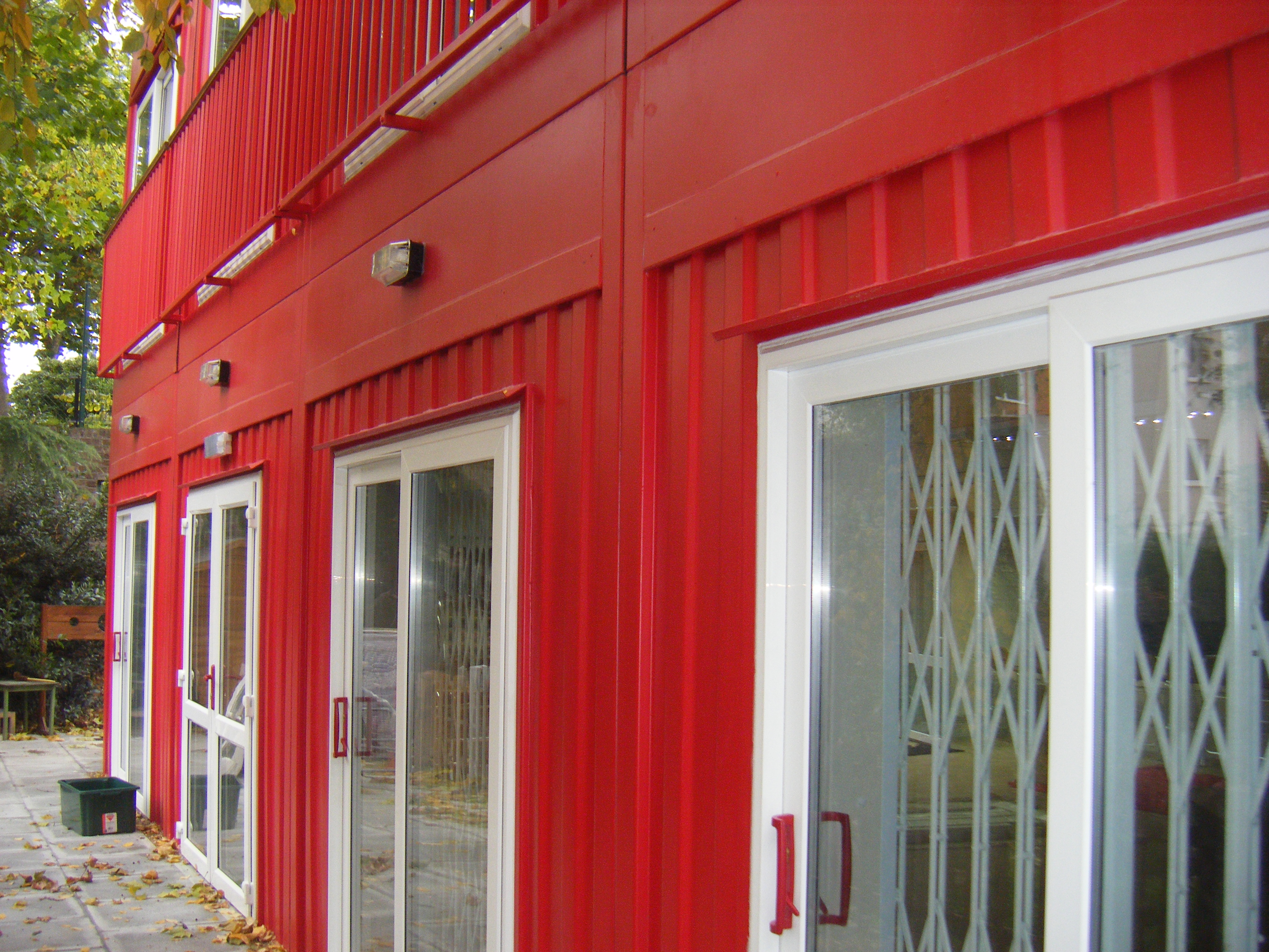 Outside red modular container class room