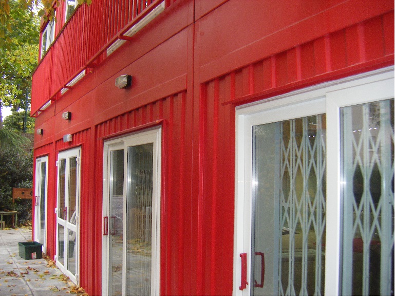 Outside red modular container class room