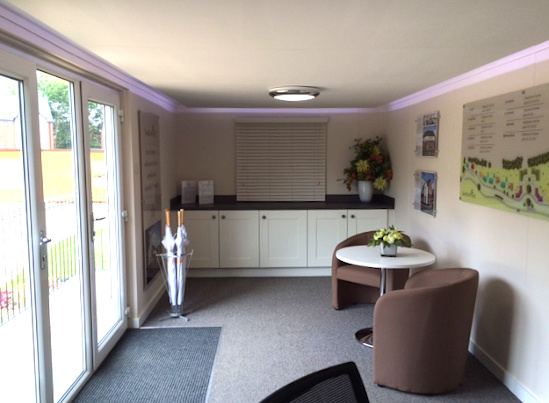 Interior of container office with wide window door