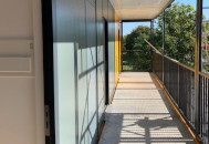 Container housing balcony