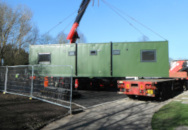 Container unit home being delivered 4