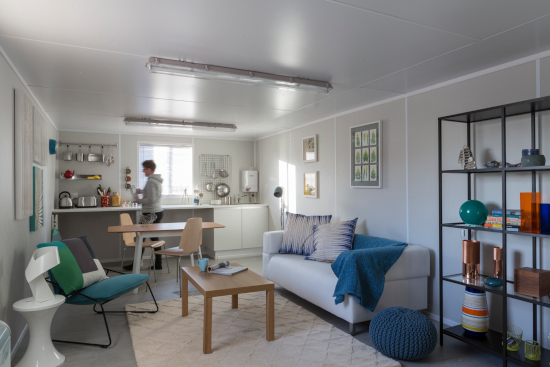 interior of housing module showing lounge and kitchen