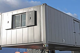 Container building showing end with window and underside