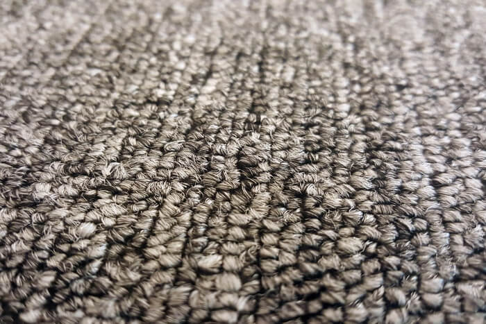 close up view of plain grey carpet