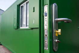 Container building door lock and handle