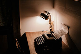 Typewriter and desk lamp