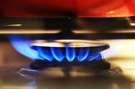 Close up view of a gas burner on a cooker