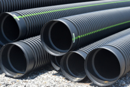 Large black plastic duct pipes