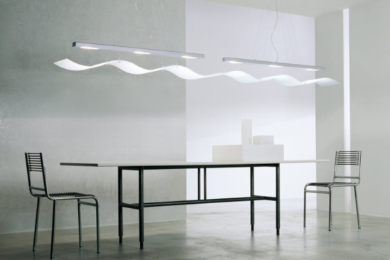 Contemporary lighting over table and chairs